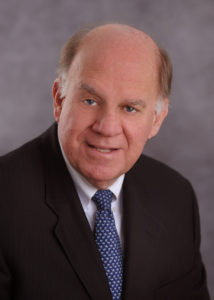 Head shot of John J. Bishar Executive Vice President, General Counsel