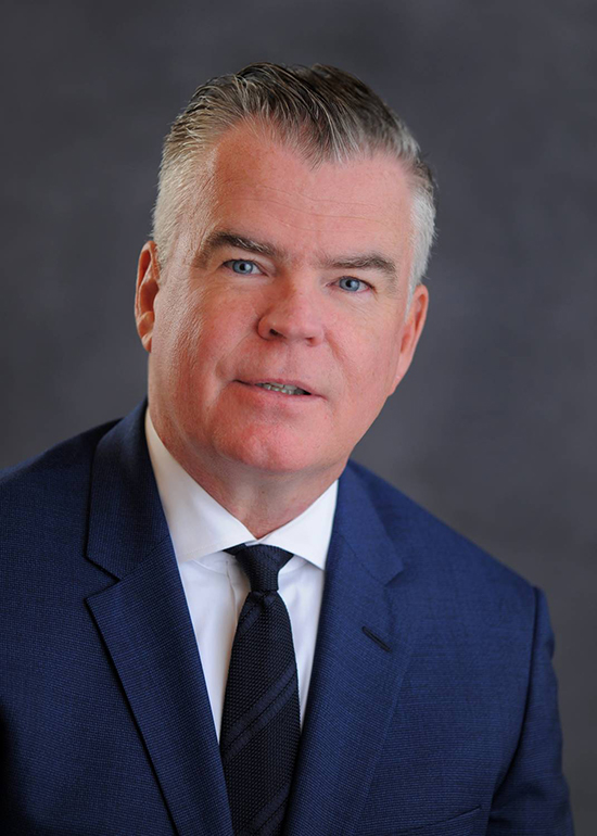 Head shot of John G. Caulfield Executive Vice President, Chief Operating Officer, Agency Lending