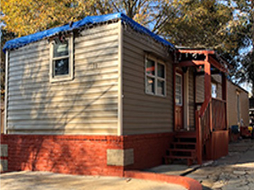 Exterior of home at Clayton Village Mobile Home Park