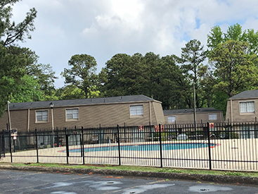 Pool and apartments at Sterling Cove Apartment complex