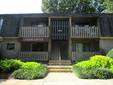 Exterior of Random Woods leasing office and apartments