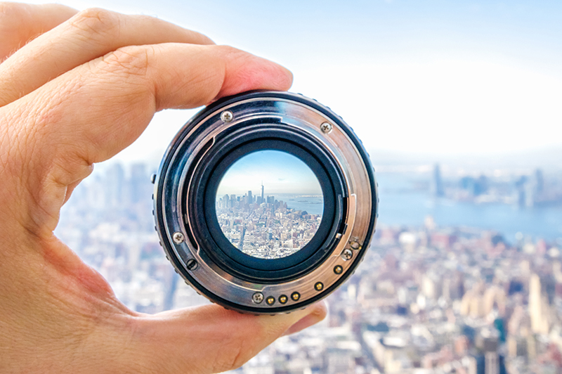 Cityscape through objective lens of binocular
