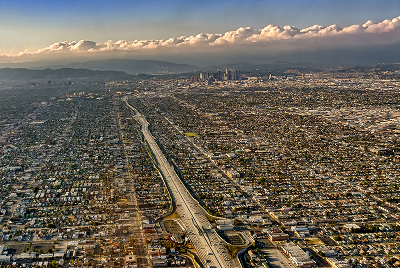 Aerial view of greater Los Angeles, freeway and downtown LA at a distance